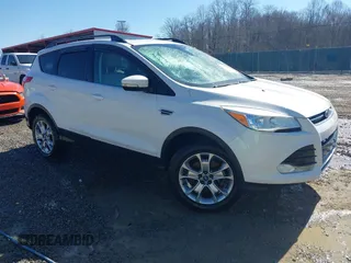 2013 Ford Escape SEL z VIN 1FMCU9HX1DUB37918, wystawiony jako IAAI lot #41644931 z przebiegiem 153 726 mil mil oraz . Historia ofert i sprzedaży dostępna na DreamBid. Obrazek 1.