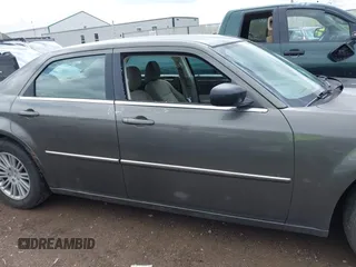 2009 Chrysler 300 LX with VIN 2C3KA43D49H558006, listed as a IAAI auction lot 42178195 with 208,864 mi miles and . Bid and sale history available at carsss.com. Image 14.