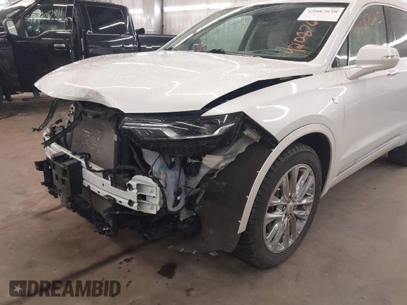 2022 Cadillac XT6 Premium Luxury with VIN 1GYKPDRS3NZ131095, listed as a IAAI auction lot 42087620 with 36,740 mi miles and . Bid and sale history available at DreamBid. Image 19.