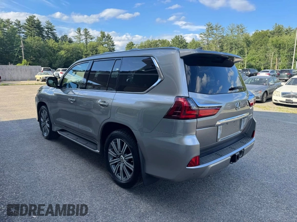 2016 Lexus LX 570 with VIN JTJHY7AX4G4198811, listed as a Copart auction lot 64898475 with 107,759 mi miles and Clean title. Bid and sale history available at DreamBid. Image 3.