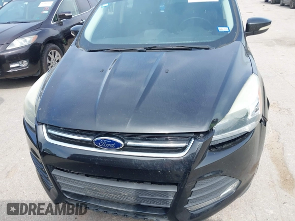 2014 Ford Escape Titanium with VIN 1FMCU0JX5EUB43194, listed as a IAAI auction lot 42084883 with 71,819 mi miles. Bid and sale history available at carsss.com. Image 6.