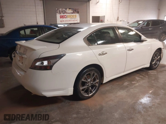 2014 Nissan Maxima SV z VIN 1N4AA5APXEC478724, wystawiony jako IAAI lot #41335407 z przebiegiem 161 985 mil mil oraz . Historia ofert i sprzedaży dostępna na DreamBid. Obrazek 4.
