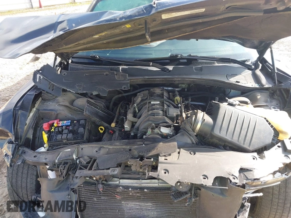 2021 Dodge Charger Police with VIN 2C3CDXAT5MH663136, listed as a IAAI auction lot 40348927 with 66,501 mi miles and . Bid and sale history available at DreamBid. Image 10.