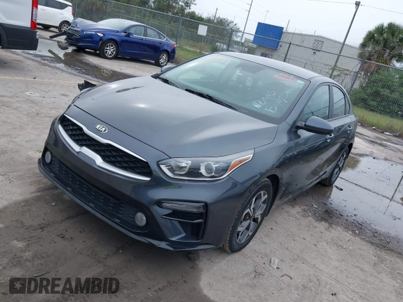 2021 Kia Forte LXS with VIN 3KPF24AD3ME314039, listed as a IAAI auction lot 38135646 with 82,935 mi miles. Bid and sale history available at carsss.com. Image 2.