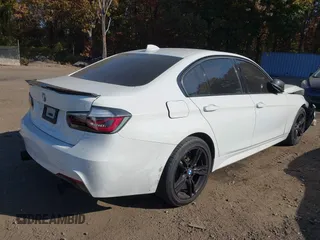 2018 BMW 3 Series 330i xDrive with VIN WBA8D9G55JNU67347, listed as a IAAI auction lot 40597140 with 68,557 mi miles. Bid and sale history available at carsss.com. Image 4.