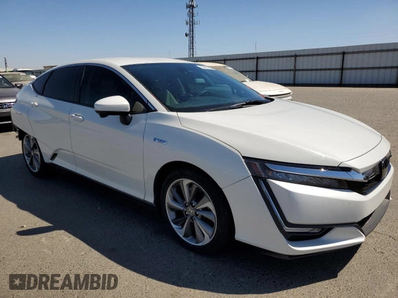 2018 Honda Clarity Plug-In Hybrid with VIN JHMZC5F11JC013897, listed as a Copart auction lot 68315094 with 99,486 mi miles and Salvage Title. Bid and sale history available at carsss.com. Image 4.