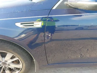 2017 Kia Optima LX with VIN 5XXGT4L35HG174613, listed as a IAAI auction lot 42097790 with 243,335 mi miles. Bid and sale history available at carsss.com. Image 6.