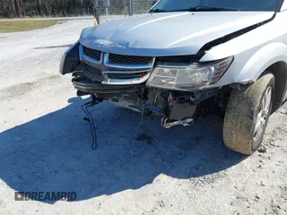 2014 Dodge Journey American Value Pkg with VIN 3C4PDCAB7ET259230, listed as a IAAI auction lot 41675179 with 151,386 mi miles. Bid and sale history available at carsss.com. Image 6.