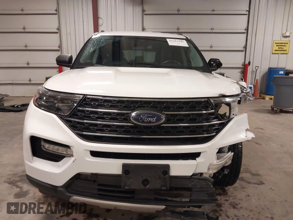 2022 Ford Explorer XLT z VIN 1FMSK8DH4NGB05636, wystawiony jako IAAI lot #42211545 z przebiegiem 55 366 mil mil oraz . Historia ofert i sprzedaży dostępna na DreamBid. Obrazek 13.