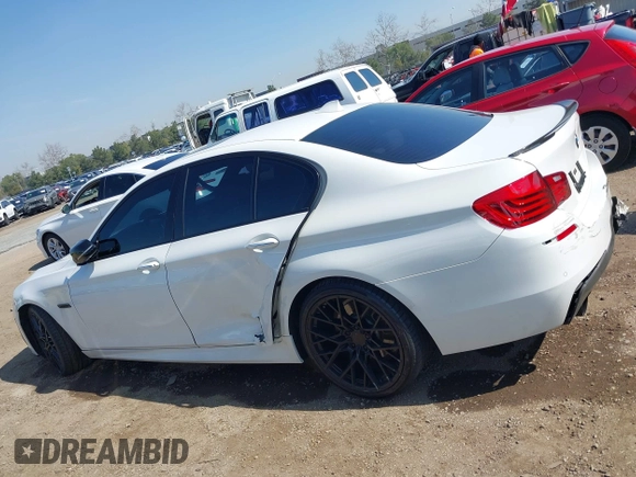 2016 BMW 5 Series 535i with VIN WBA5B1C54GG134991, listed as a IAAI auction lot 41573388 with 91,161 mi miles and . Bid and sale history available at DreamBid. Image 14.