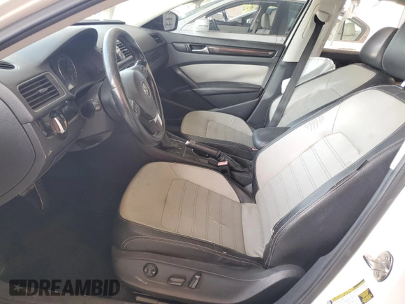 2015 Volkswagen Passat SE with VIN 1VWBS7A33FC026231, listed as a Copart auction lot 52021205 with 180,507 mi miles and Salvage title. Bid and sale history available at DreamBid. Image 7.