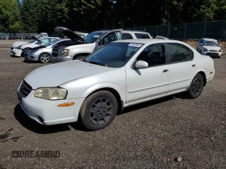 2000 Nissan Maxima GXE z VIN JN1CA31D0YT743476, wystawiony jako Copart lot #70160544 z przebiegiem 225 499 mil mil oraz Szkoda całkowita • Salvage title. Historia ofert i sprzedaży dostępna na DreamBid. Obrazek 1.