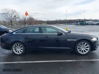 2011 Jaguar XJ with VIN SAJWA1CB8BLV12389, listed as a IAAI auction lot 41957217 with 51,585 mi miles. Bid and sale history available at carsss.com. Image 13.