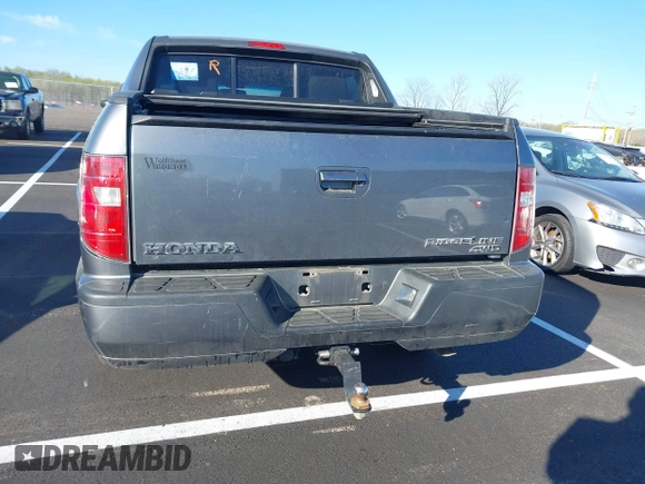 2009 Honda Ridgeline RTL with VIN 2HJYK16589H502832, listed as a IAAI auction lot 41878496 with 101,695 mi miles and . Bid and sale history available at DreamBid. Image 17.