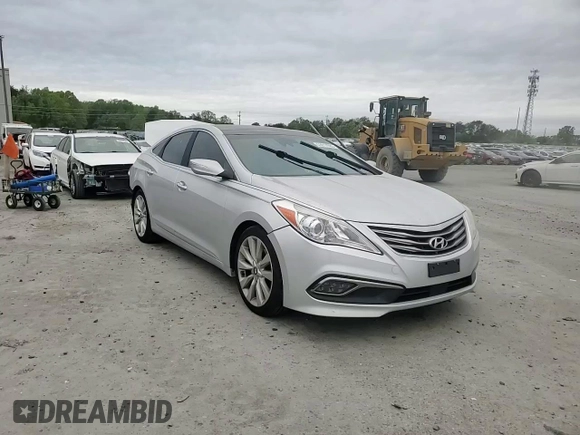 2016 Hyundai Azera Limited z VIN KMHFH4JG6GA518314, wystawiony jako Copart lot #53917085 z przebiegiem 192 713 mil mil oraz Szkoda całkowita • Salvage title. Historia ofert i sprzedaży dostępna na DreamBid. Obrazek 13.