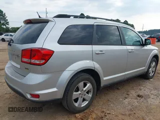 2012 Dodge Journey SXT z VIN 3C4PDCBG4CT189046, wystawiony jako IAAI lot #42410786 z przebiegiem 147 928 mil mil oraz . Historia ofert i sprzedaży dostępna na DreamBid. Obrazek 4.