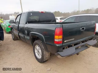 2002 Chevrolet Silverado 1500 LS with VIN 1GCEK19TX2E298985, listed as a IAAI auction lot 41459560 with 123,180 mi miles. Bid and sale history available at carsss.com. Image 3.