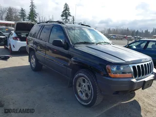 1999 Jeep Grand Cherokee Laredo with VIN 1J4GW58S6XC524451, listed as a IAAI auction lot 41741007 with 162,441 mi miles. Bid and sale history available at carsss.com. Image 1.