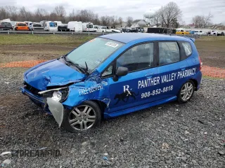 2007 Honda Fit Sport z VIN JHMGD38657S003809, wystawiony jako Copart lot #51541315 z przebiegiem 219 389 mil mil oraz Szkoda całkowita • Salvage title. Historia ofert i sprzedaży dostępna na DreamBid. Obrazek 1.