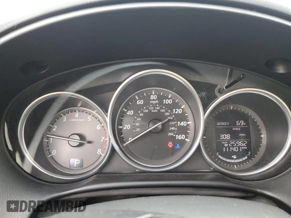 2014 Mazda CX-5 Touring with VIN JM3KE2CY8E0424757, listed as a Copart auction lot 54703195 with 111,401 mi miles and Salvage Title. Bid and sale history available at DreamBid. Image 9.