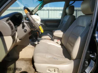 2006 Lexus LX 470 with VIN JTJHT00W664006446, listed as a Copart auction lot 73165774 with 294,950 mi miles and Salvage Title. Bid and sale history available at carsss.com. Image 7.