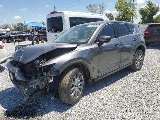 2021 Mazda CX-5 Grand Touring with VIN JM3KFADMXM1300565, listed as a Copart auction lot 53003705 with 40,911 mi miles and Non Repairable. Bid and sale history available at carsss.com. Image 1.