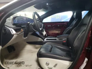2022 Lucid Air Grand Touring z VIN 50EA1GBA0NA001260, wystawiony jako Copart lot #52131155 z przebiegiem 25 673 mil mil oraz Szkody całkowita. Historia ofert i sprzedaży dostępna na DreamBid. Obrazek 7.