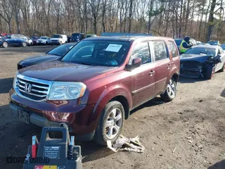 2014 Honda Pilot EX-L with VIN 5FNYF4H50EB040497, listed as a IAAI auction lot 41844399 with 120,103 mi miles. Bid and sale history available at carsss.com. Image 2.