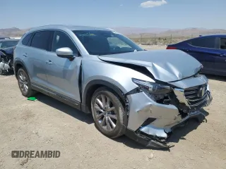 2021 Mazda CX-9 Grand Touring z VIN JM3TCADY4M0512268, wystawiony jako Copart lot #62683464 z przebiegiem Nie podano mil oraz Szkoda całkowita • Salvage title. Historia ofert i sprzedaży dostępna na DreamBid. Obrazek 4.