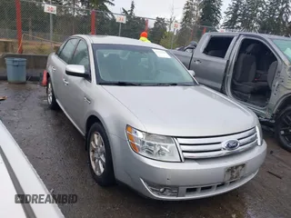 2009 Ford Taurus SE with VIN 1FAHP23WX9G122613, listed as a IAAI auction lot 41573244 with 111,820 mi miles. Bid and sale history available at carsss.com. Image 1.
