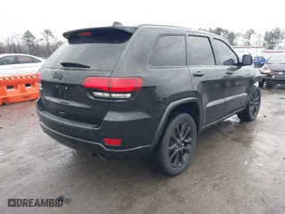 2021 Jeep Grand Cherokee Laredo X with VIN 1C4RJEAG1MC680282, listed as a IAAI auction lot 41466496 with 58,855 mi miles. Bid and sale history available at carsss.com. Image 4.