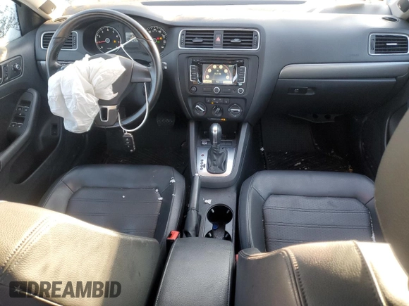 2014 Volkswagen Jetta SEL z VIN 3VWL17AJ6EM438176, wystawiony jako Copart lot #85081294 z przebiegiem 108 420 mil mil oraz Szkoda całkowita • Salvage title. Historia ofert i sprzedaży dostępna na DreamBid. Obrazek 8.
