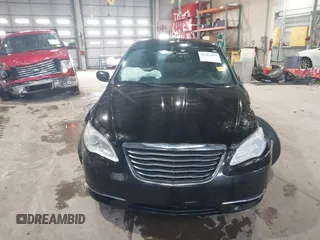 2013 Chrysler 200 Touring with VIN 1C3CCBBB6DN501373, listed as a IAAI auction lot 41587159 with 193,410 mi miles and . Bid and sale history available at DreamBid. Image 12.
