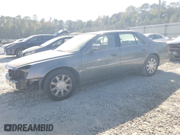 2008 Cadillac DTS 1SD z VIN 1G6KD57Y68U140938, wystawiony jako Copart lot #77525974 z przebiegiem 148 132 mil mil oraz Szkoda całkowita • Salvage title. Historia ofert i sprzedaży dostępna na DreamBid. Obrazek 1.