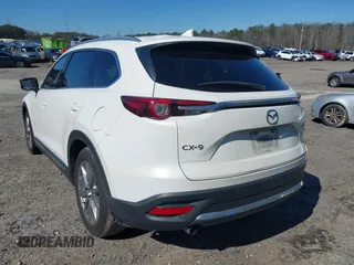 2020 Mazda CX-9 Grand Touring with VIN JM3TCADYXL0415090, listed as a IAAI auction lot 41599205 with 133,080 mi miles. Bid and sale history available at carsss.com. Image 3.