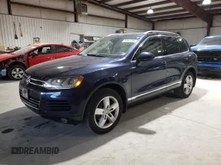 2012 Volkswagen Touareg Exec with VIN WVGEF9BP4CD011773, listed as a Copart auction lot 82461264 with 230,231 mi miles and Clean Title. Bid and sale history available at DreamBid. Image 1.
