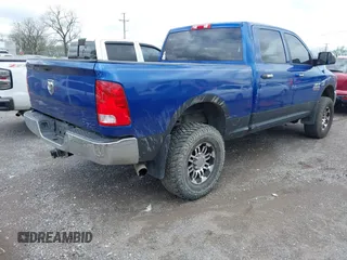 2014 Ram 2500 Tradesman with VIN 3C6UR5CL3EG302645, listed as a IAAI auction lot 41985091 with 144,384 mi miles and . Bid and sale history available at DreamBid. Image 4.