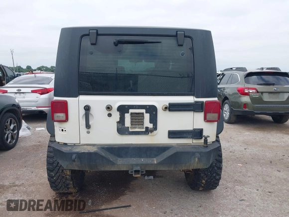 2008 Jeep Wrangler X z VIN 1J4FZ24108L653849, wystawiony jako IAAI lot #42305913 z przebiegiem 220 937 mil mil oraz . Historia ofert i sprzedaży dostępna na DreamBid. Obrazek 15.
