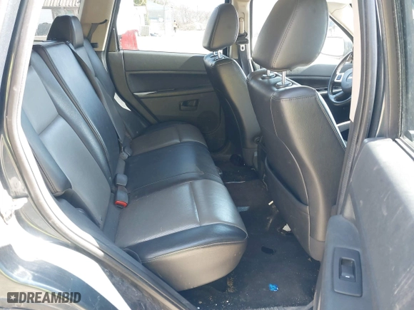 2008 Jeep Grand Cherokee Laredo with VIN 1J8GR48K98C161239, listed as a IAAI auction lot 42090850 with 218,063 mi miles. Bid and sale history available at carsss.com. Image 8.