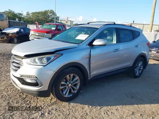 2018 Hyundai Santa Fe 2.0T z VIN 5XYZU4LA1JG516466, wystawiony jako IAAI lot #42265607 z przebiegiem 110 655 mil mil oraz . Historia ofert i sprzedaży dostępna na DreamBid. Obrazek 18.