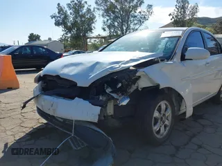 2006 Hyundai Accent GLS with VIN KMHCN46C36U040545, listed as a IAAI auction lot 42021545 with 224,058 mi miles. Bid and sale history available at carsss.com. Image 6.