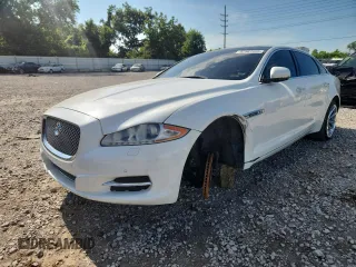 2012 Jaguar XJ Supercharged with VIN SAJWA2GE7CMV28878, listed as a Copart auction lot 62561695 with 94,208 mi miles and Salvage title. Bid and sale history available at DreamBid. Image 1.