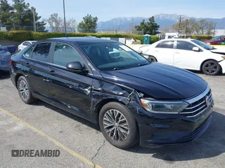 2019 Volkswagen Jetta SEL z VIN 3VWE57BU8KM101669, wystawiony jako IAAI lot #41849895 z przebiegiem 113 898 mil mil oraz . Historia ofert i sprzedaży dostępna na DreamBid. Obrazek 1.