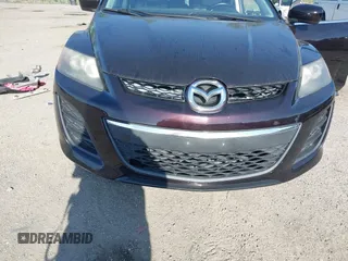 2011 Mazda CX-7 S Touring z VIN JM3ER4CLXB0358063, wystawiony jako IAAI lot #42325445 z przebiegiem 156 206 mil mil oraz . Historia ofert i sprzedaży dostępna na DreamBid. Obrazek 6.