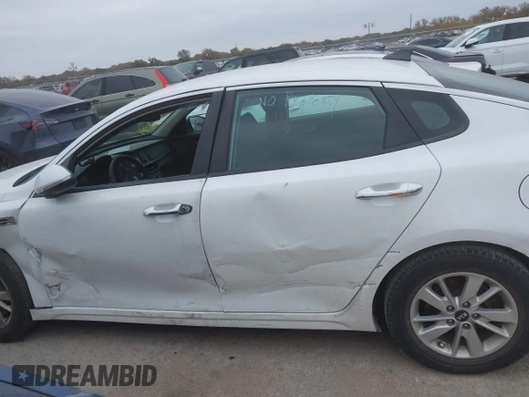 2016 Kia Optima LX with VIN KNAGT4L39G5104726, listed as a IAAI auction lot 40950914 with 128,728 mi miles. Bid and sale history available at carsss.com. Image 14.