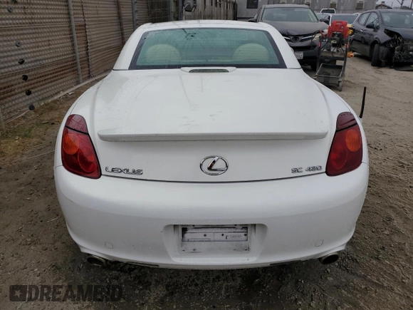 2004 Lexus SC 430 with VIN JTHFN48Y040054660, listed as a Copart auction lot 64510515 with 79,452 mi miles and Salvage title. Bid and sale history available at DreamBid. Image 6.