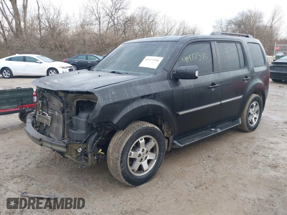 2011 Honda Pilot Touring with VIN 5FNYF4H94BB089930, listed as a IAAI auction lot 41477596 with 171,831 mi miles. Bid and sale history available at carsss.com. Image 20.