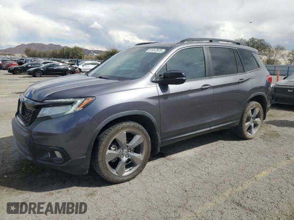 2020 Honda Passport Touring z VIN 5FNYF8H9XLB007336, wystawiony jako Copart lot #51012975 z przebiegiem 74 620 mil mil oraz Szkoda całkowita • Salvage title. Historia ofert i sprzedaży dostępna na DreamBid. Obrazek 1.