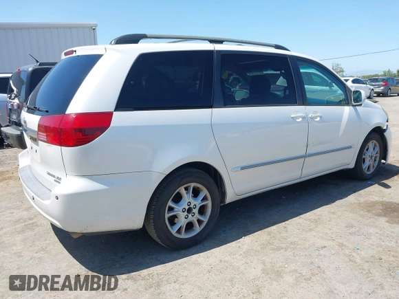 2005 Toyota Sienna XLE with VIN 5TDZA22C25S350614, listed as a IAAI auction lot 42179349 with 219,852 mi miles and . Bid and sale history available at carsss.com. Image 4.