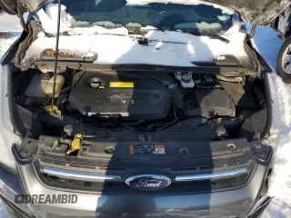 2016 Ford Escape SE z VIN 1FMCU0GX7GUA21205, wystawiony jako Copart lot #87261424 z przebiegiem 112 305 mil mil oraz Szkoda całkowita • Salvage title. Historia ofert i sprzedaży dostępna na DreamBid. Obrazek 11.